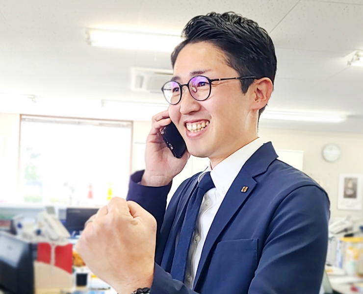 お客様から「ありがとう」と言われ喜んでいる写真